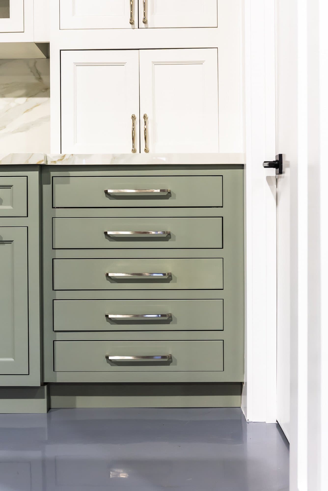 Why does the white painted door I loved in Newton look gray in my Wellesley kitchen?