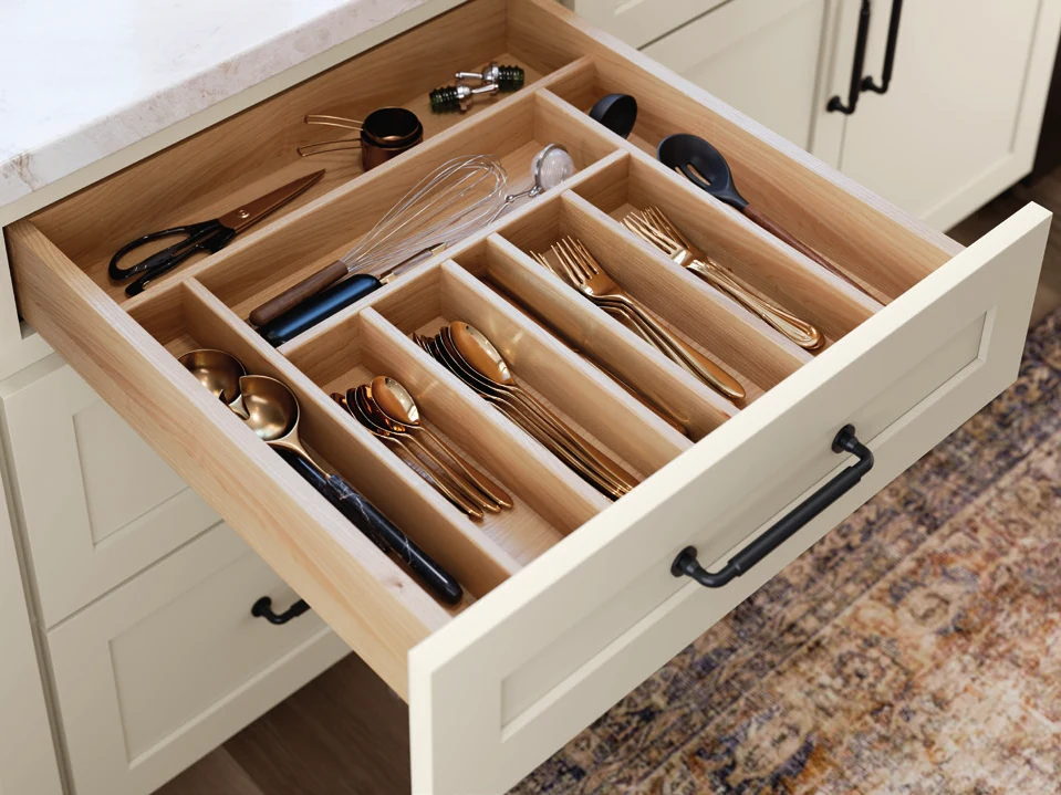 A Mantra drawer pulled all the way out, its whole cutlery insert in reach, back row included